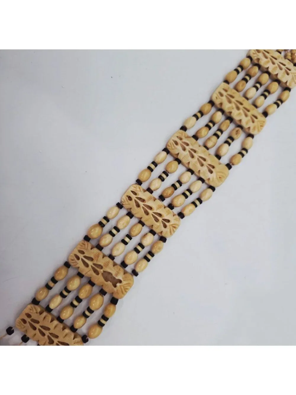 Hand-Carved Bone Beaded Belt With Intricate Leaf Pattern & Button Closure